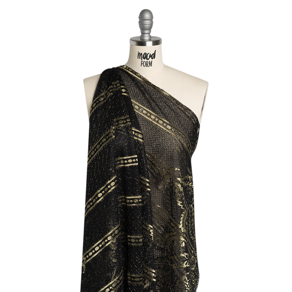 Metallic Re-Embroidered Raschel Lace - Black and Gold Stripes and Diamond Lattice with Floral Border - Joann Fabrics