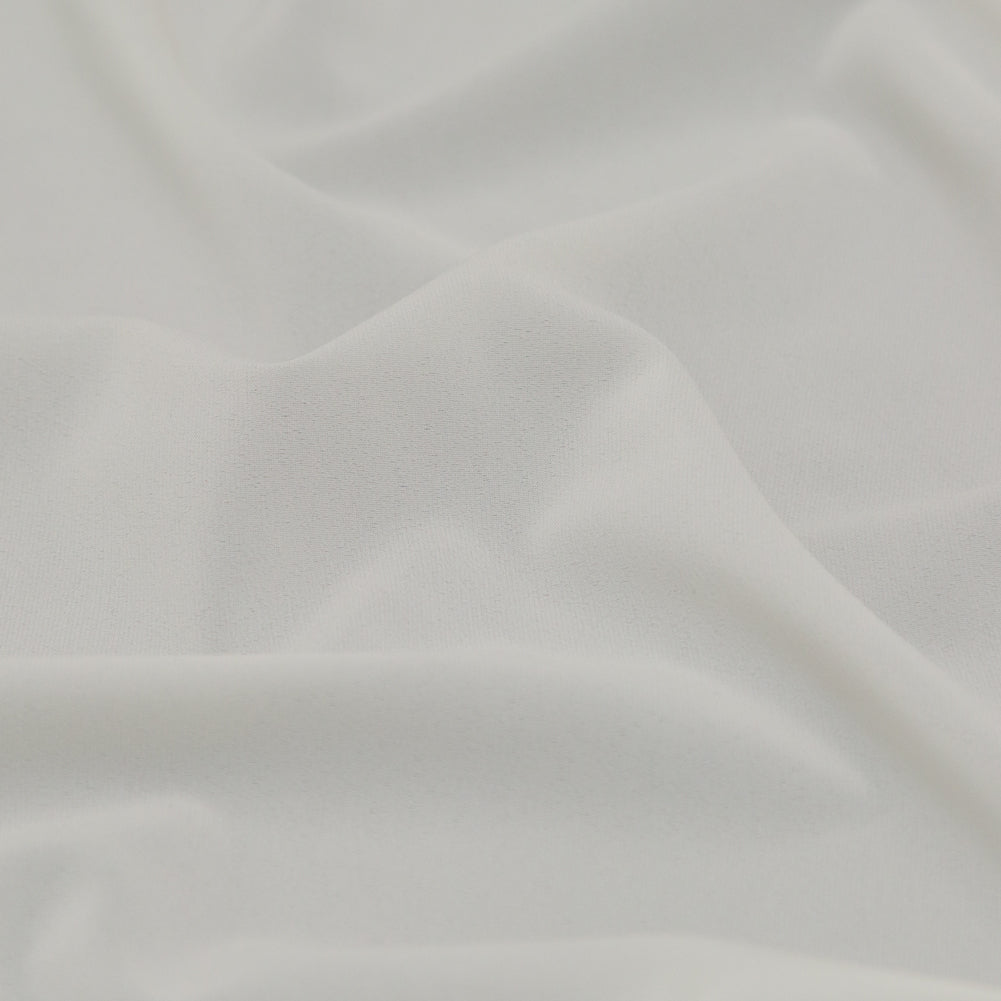 Theory Ivory Stretch Polyester Crepe - Joann Fabrics