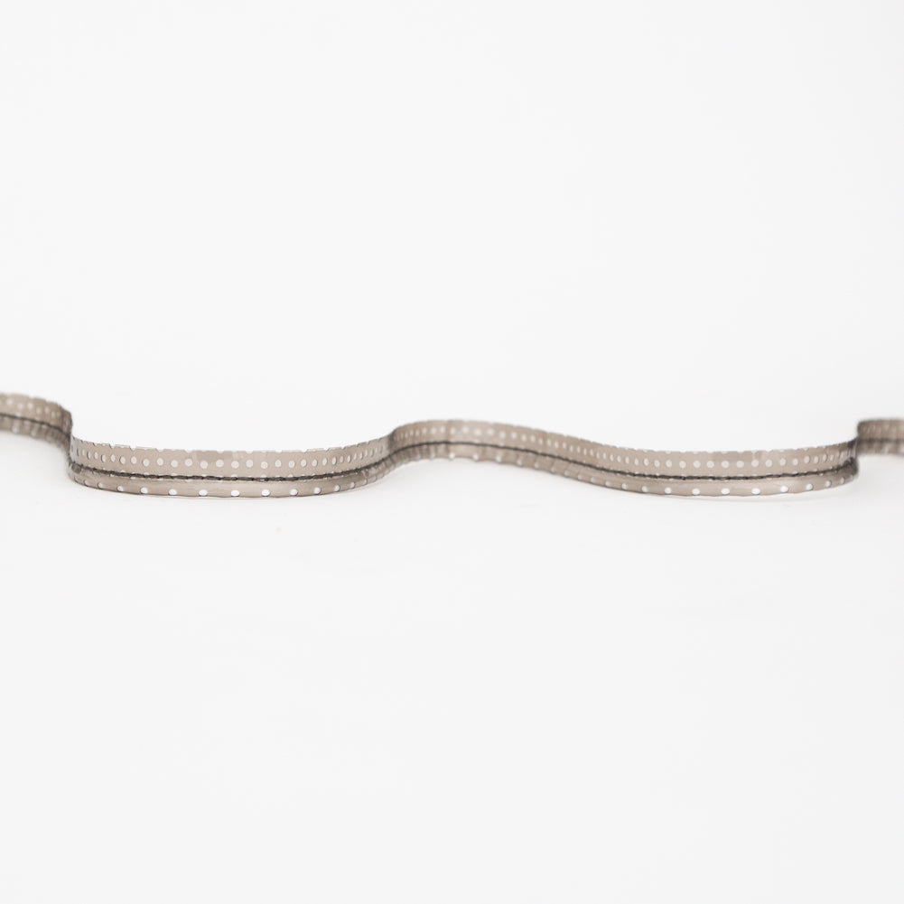 Italian White Rattail Piping with Black Perforated Plastic Casing and Lip - 0.375