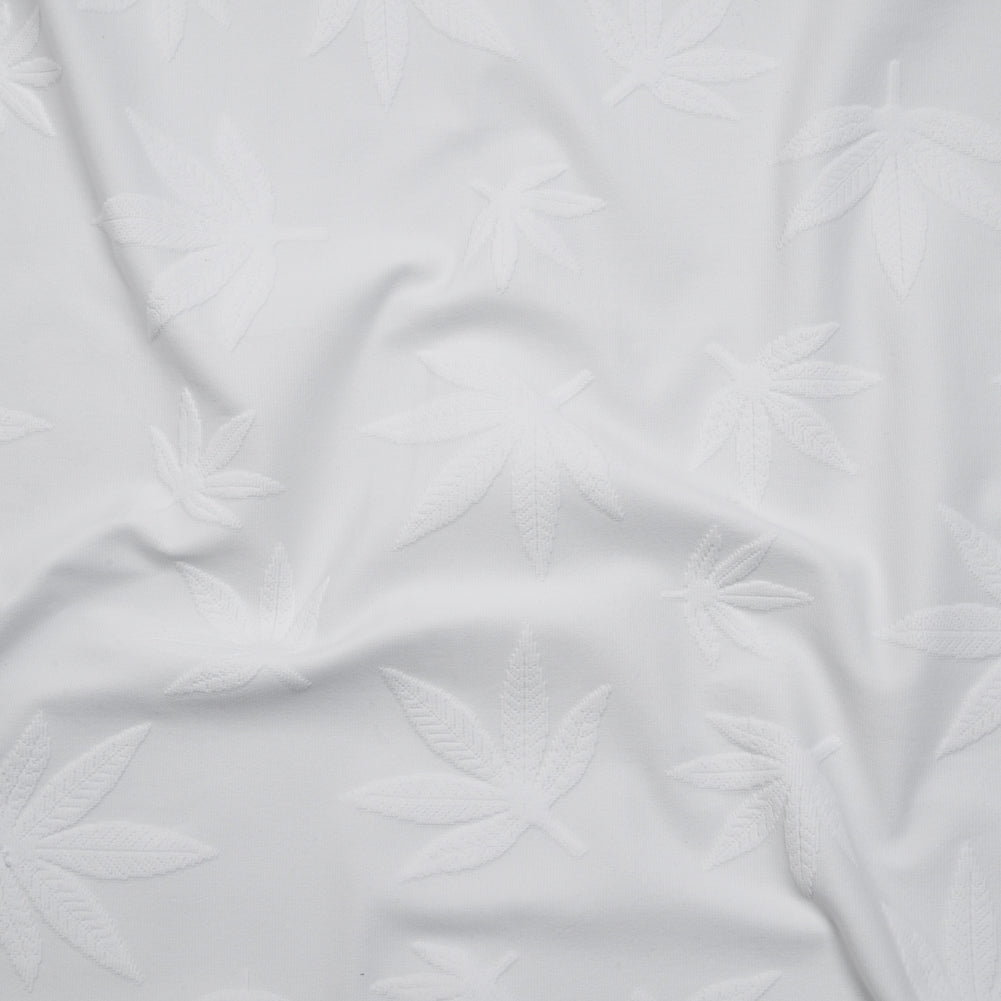 Stretch Polyester Jacquard Knit - White Scattered Leaves - Designer Deadstock - Joann Fabrics