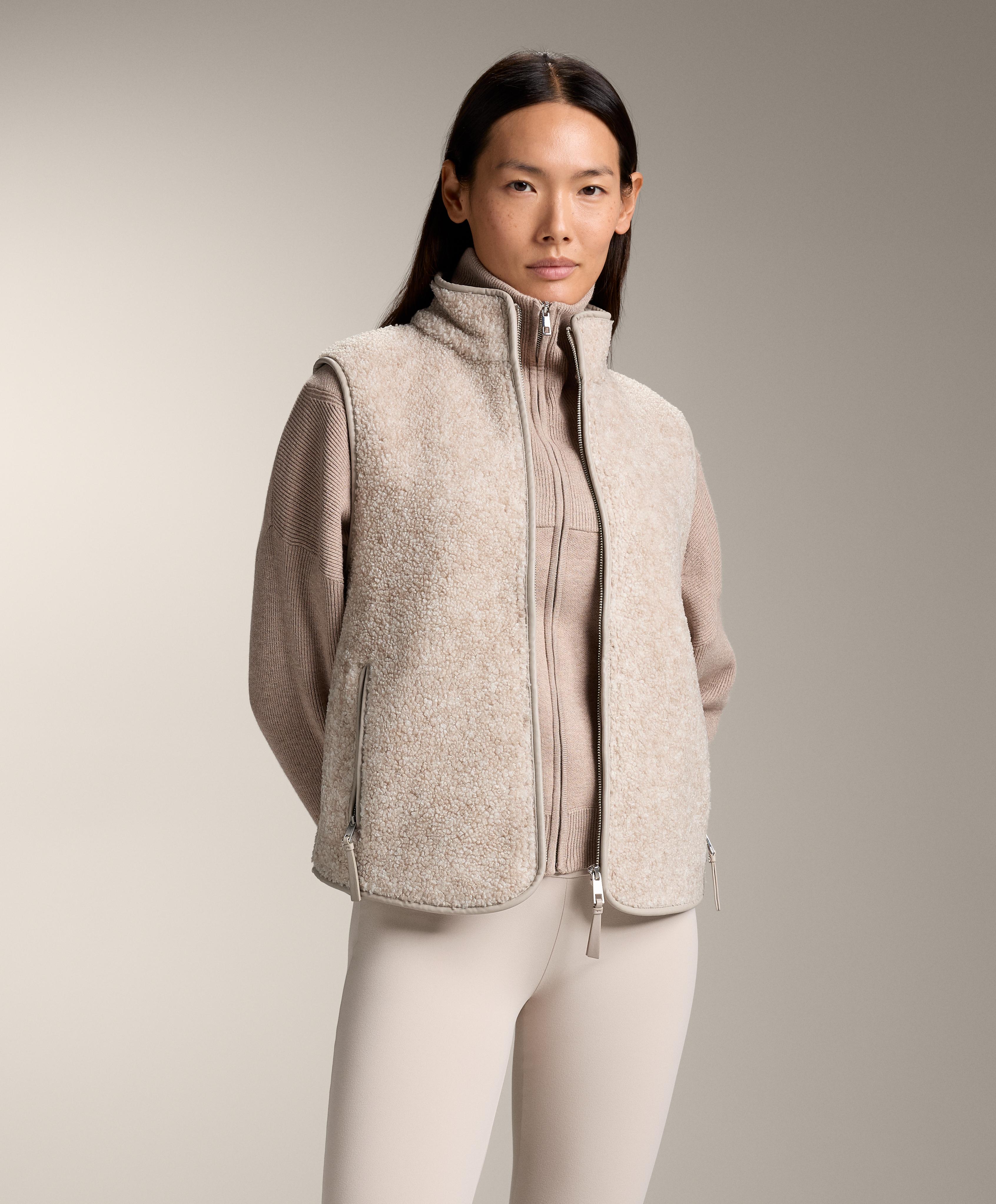 Basic faux-shearling zip-up gilet.