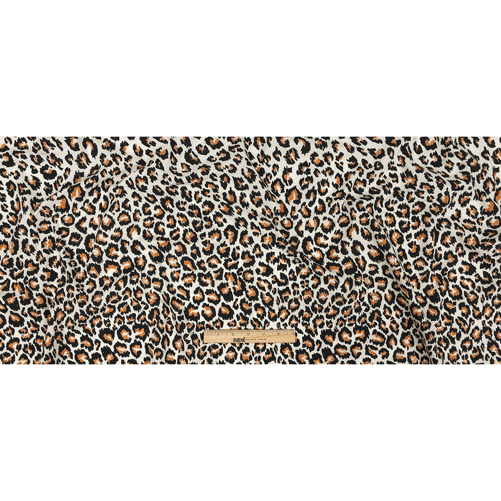 Mood Exclusive Ivory and Caramel Predator's Pride Cotton Poplin - Joann Fabrics