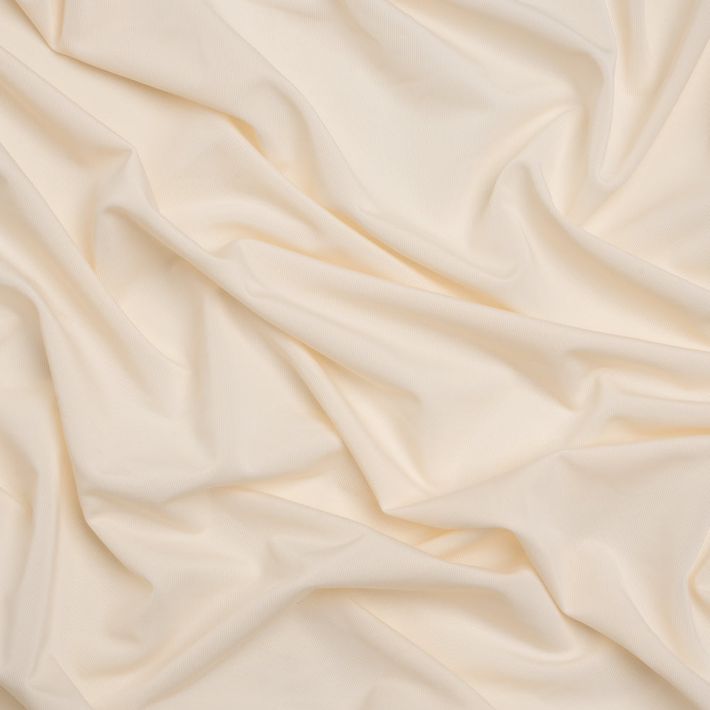 Famous Australian Designer Cream Stretch Polyester Jersey - Joann Fabrics