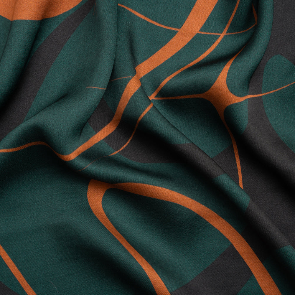 Sustainable and Recycled Viscose Satin Print - Forest Green and Orange Swirling Abstract - Mood Exclusive Atmospheric Adventure - Joann Fabrics