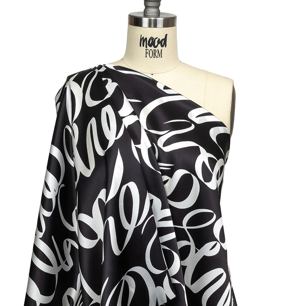 Mood Exclusive Italian Black Bean and White Calligraphic Squiggles Silk Charmeuse - Joann Fabrics