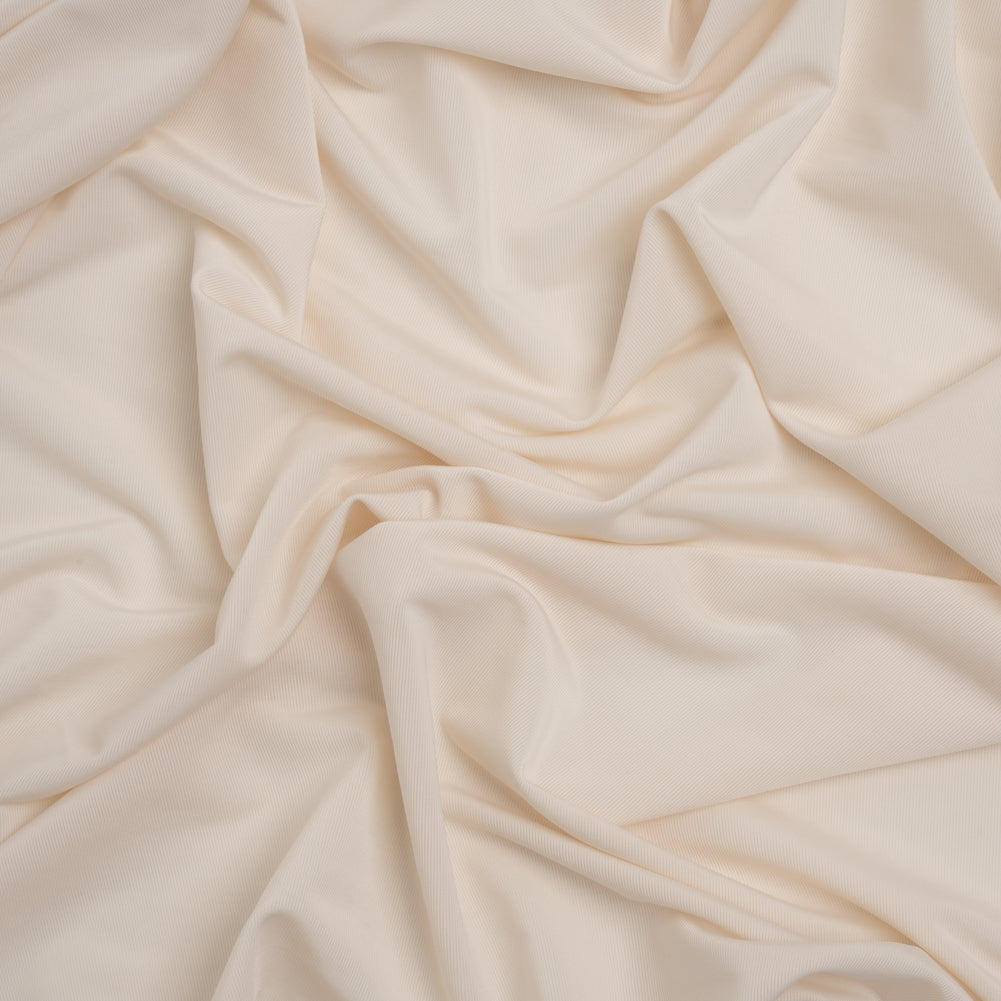 Famous Australian Designer Ecru Stretch Polyester Jersey - Joann Fabrics