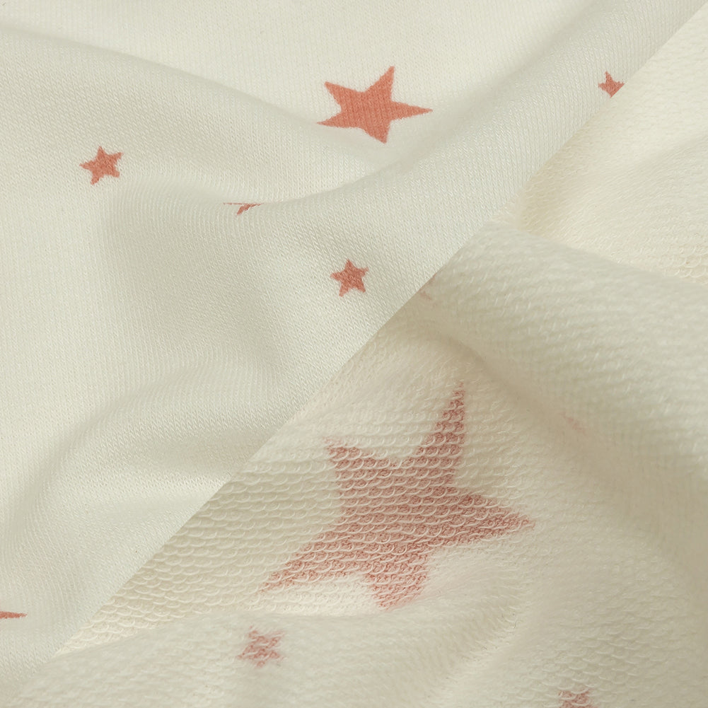 Cloud Dancer and Coral Almond Stars Stretch Polyester and Rayon French Terry - Joann Fabrics