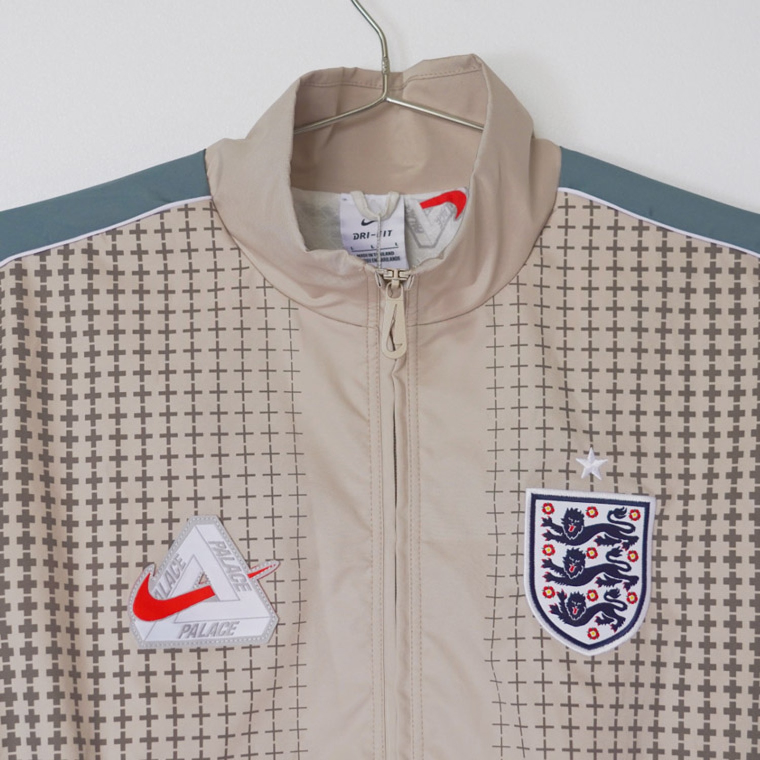 England 2026 x Palace Solo Swoosh Travel Windbreaker Jacket - UnitedFutballJersey