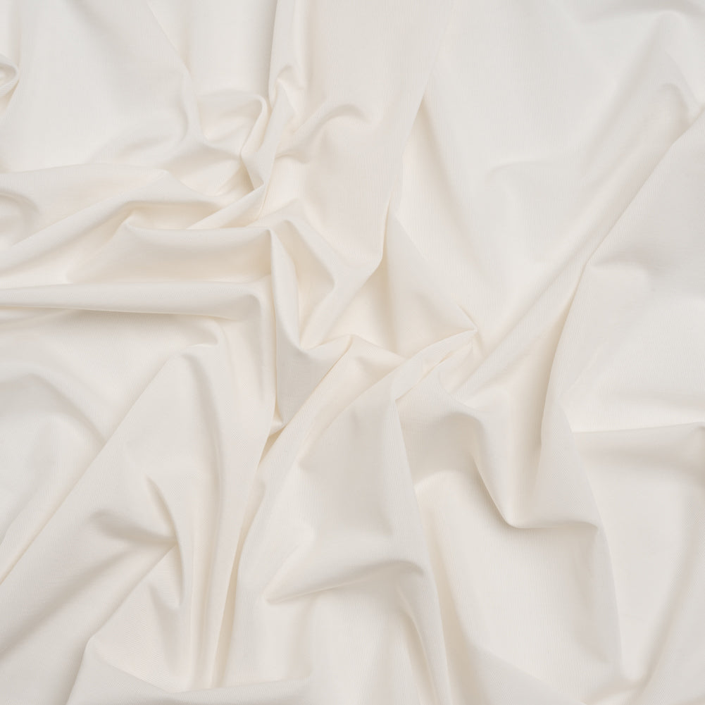 Famous Australian Designer Ivory Stretch Polyester Jersey - Joann Fabrics