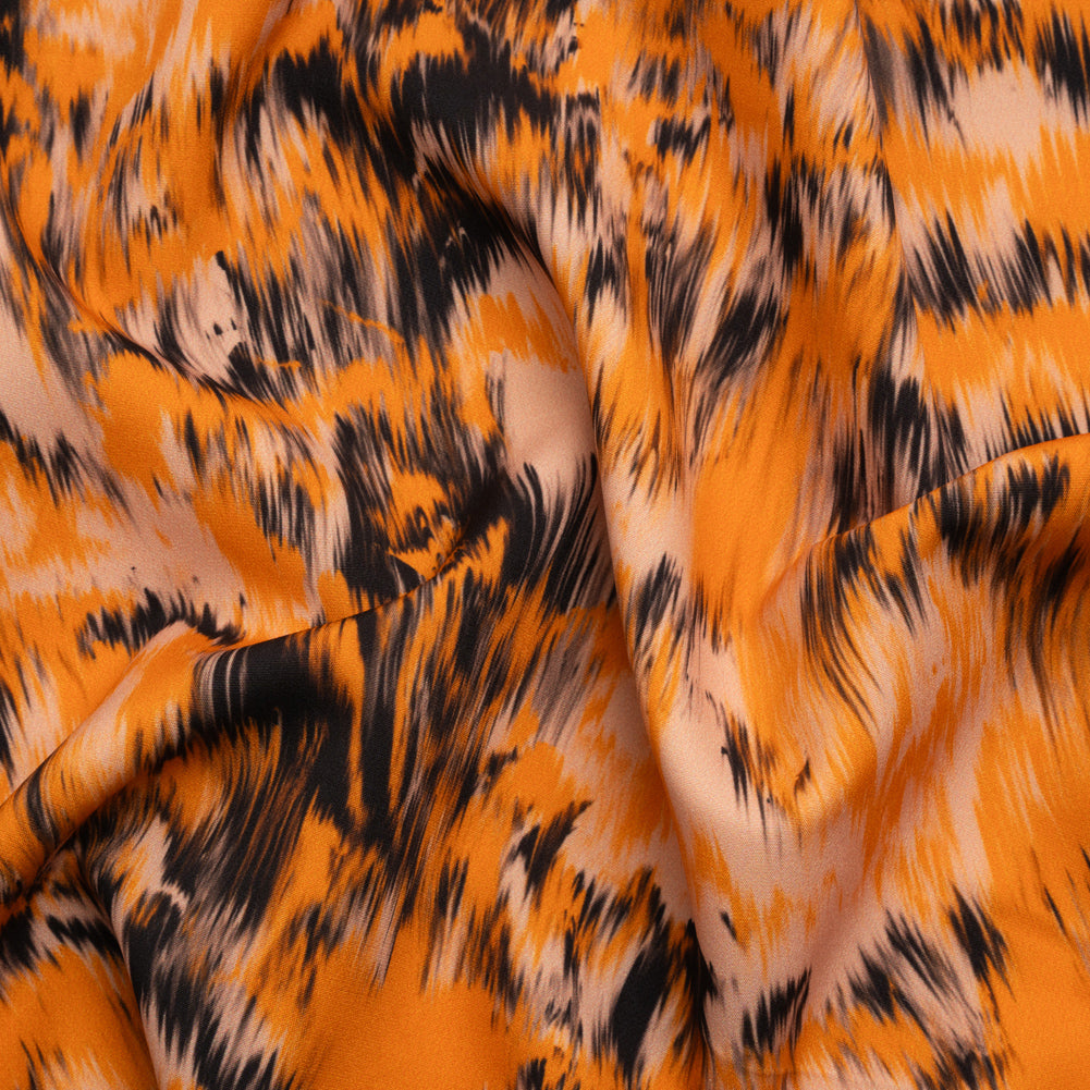 Stretch Polyester Woven Print - Orange and Black Abstract Ikat - Mood Exclusive Shifting Sands - Joann Fabrics