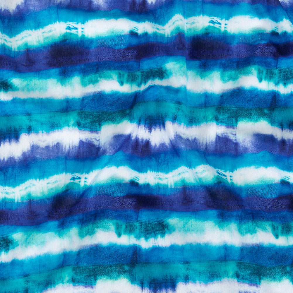 Compression Swimwear Tricot, UV Protective with Aloe Vera Microcapsules - Deep Ultramarine, Teal and White Tie Dye Stripes - Caye Collection - Joann Fabrics