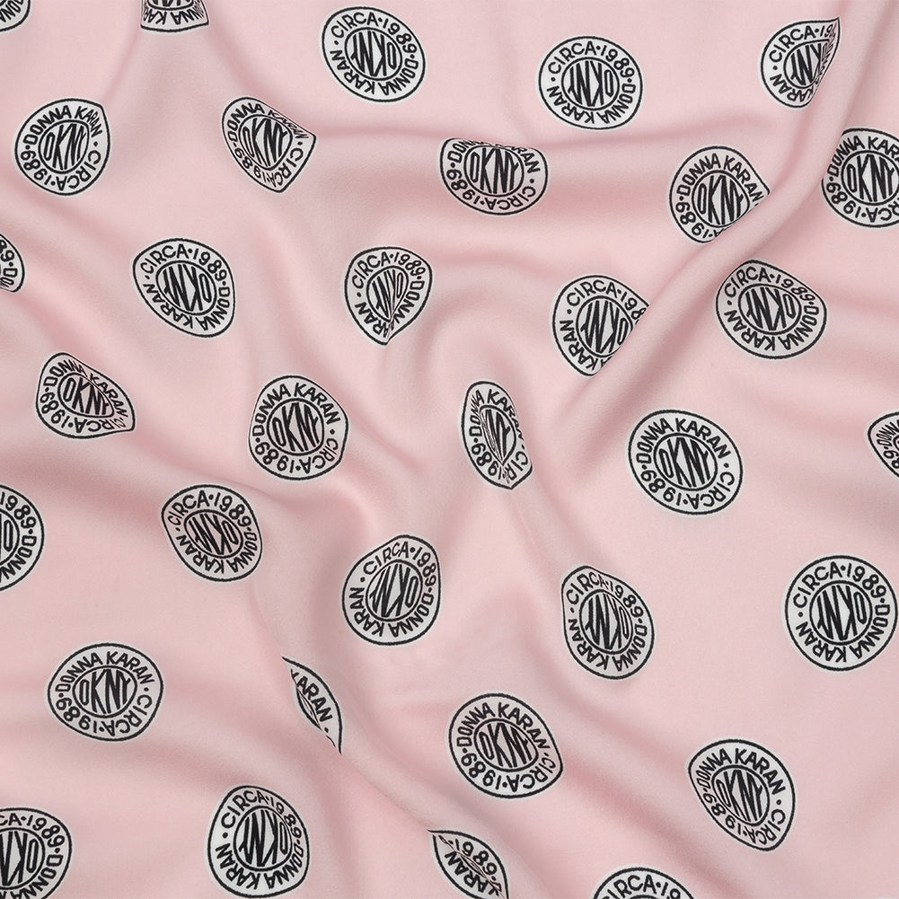 Donna Karan Pink, Black and White Logo Tokens Crepe de Chine - Joann Fabrics