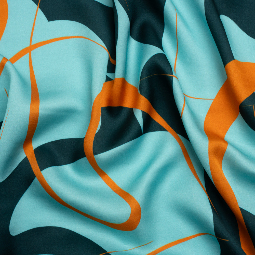 Sustainable and Recycled Viscose Satin Print - Turquoise and Orange Swirling Abstract - Mood Exclusive Atmospheric Adventure - Joann Fabrics