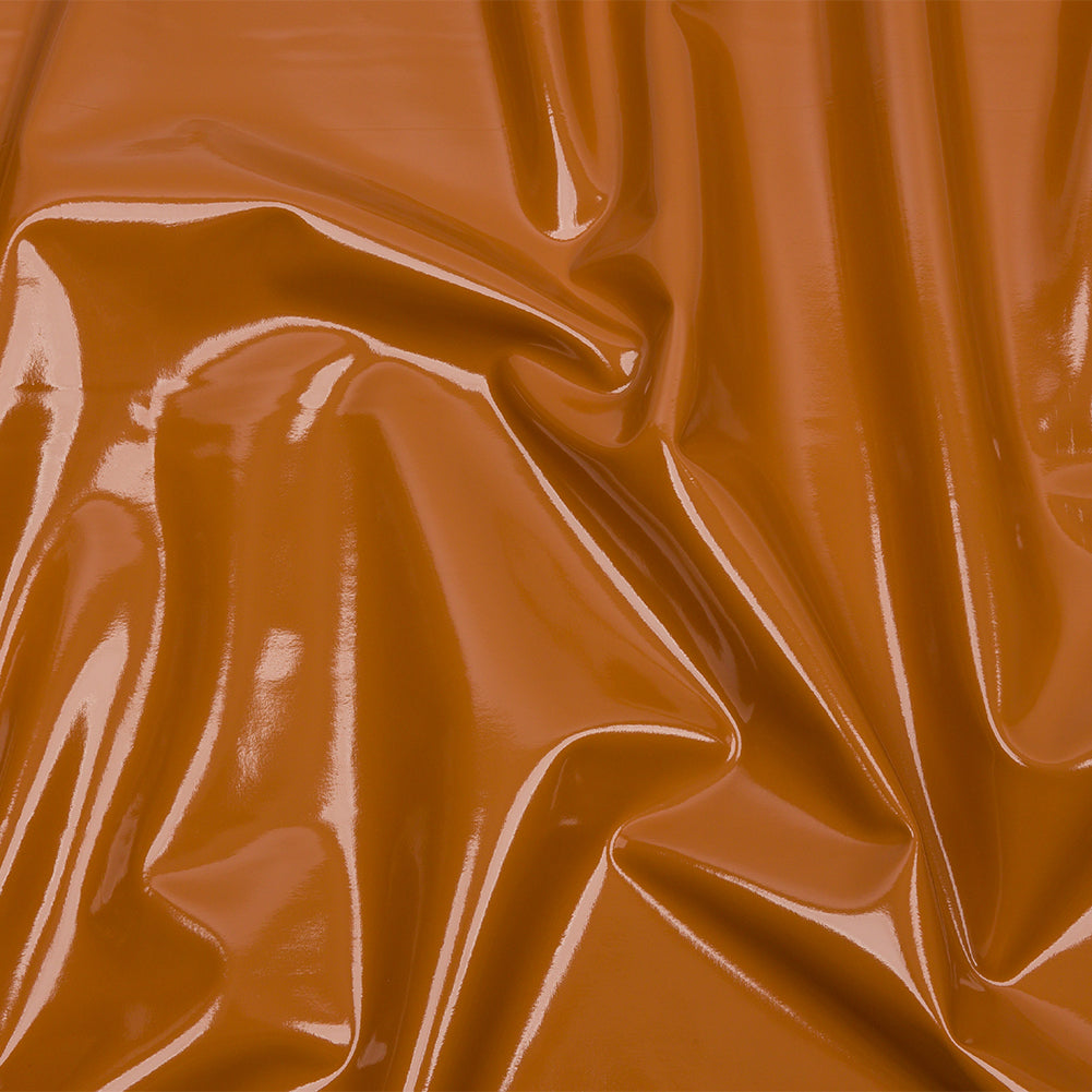 Tan Stretch Faux Patent Leather with White Viscose Jersey Backing - Joann Fabrics