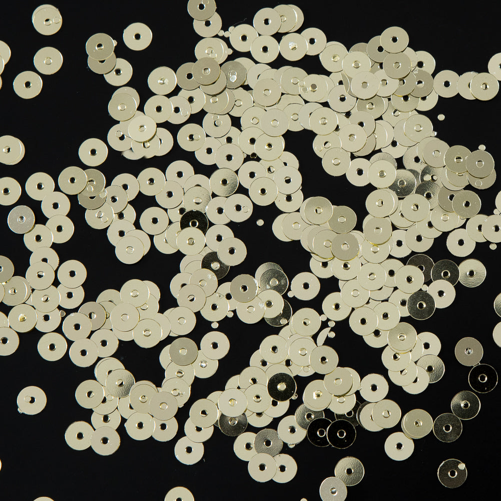 Bag of Old Gold Color Loose Sequins with Silver Back - 5mm - Joann Fabrics
