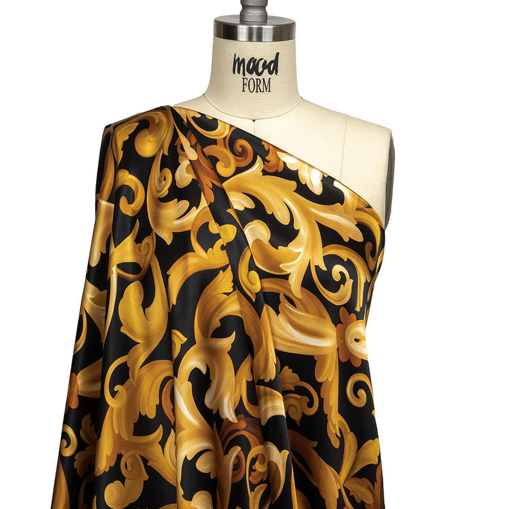 Mood Exclusive Italian Black and Gold Ornate Swirls Silk Charmeuse - Joann Fabrics