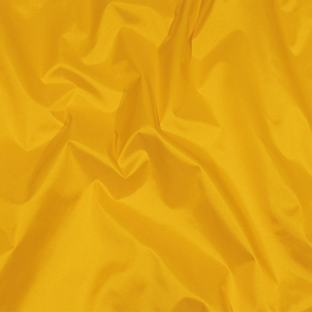 Balenciaga Italian Old Gold Lightweight Nylon Twill - Joann Fabrics