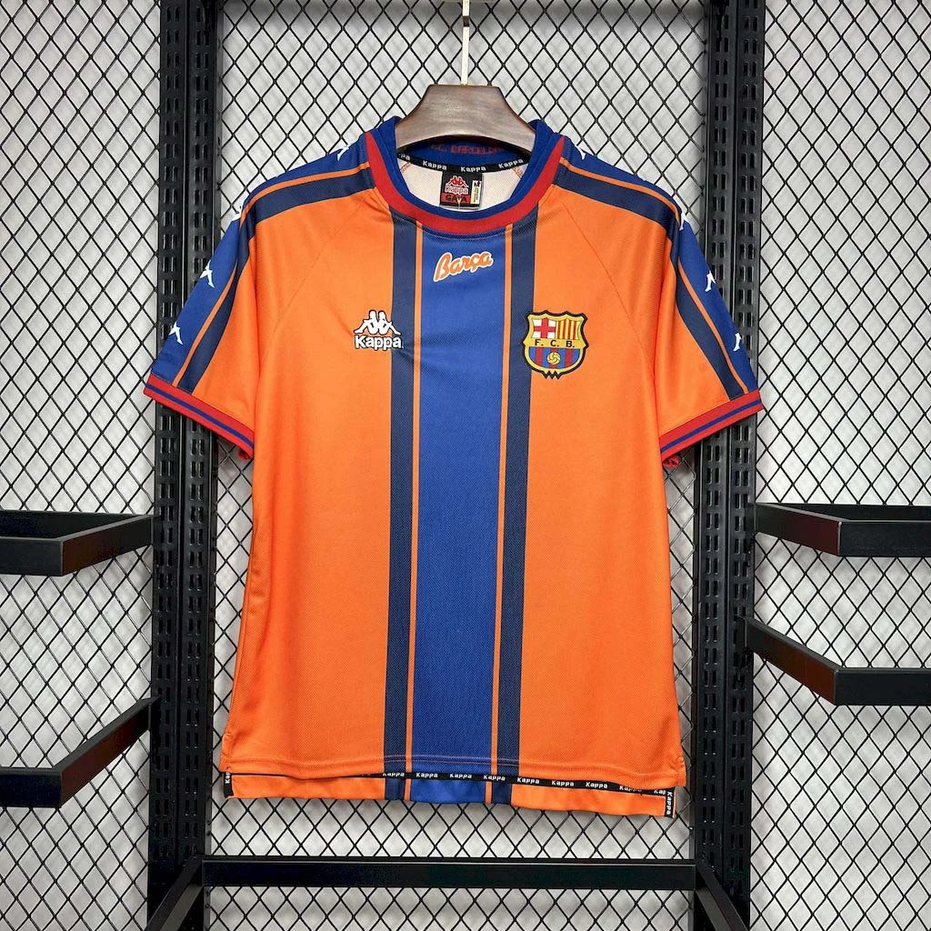 1997–98-labelled orange Barcelona away shirt with a prominent vertical blue stripe