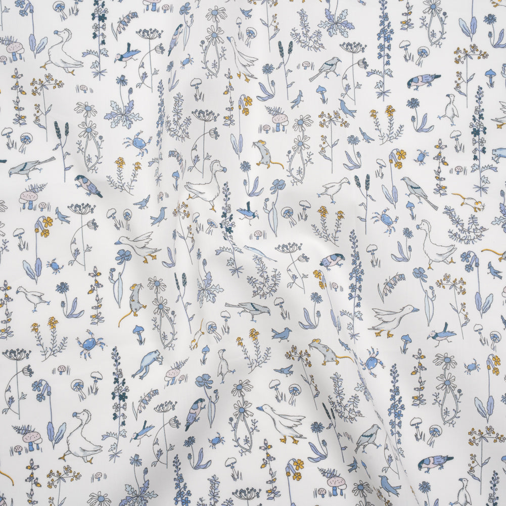 Liberty Fabrics Tana Lawn® - Theo Blue - Baby Blue, Yellow and White Cartoon Creatures and Flowers - Joann Fabrics
