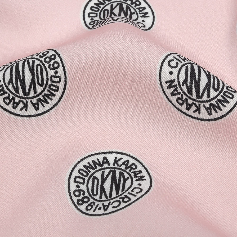 Donna Karan Pink, Black and White Logo Tokens Crepe de Chine - Joann Fabrics