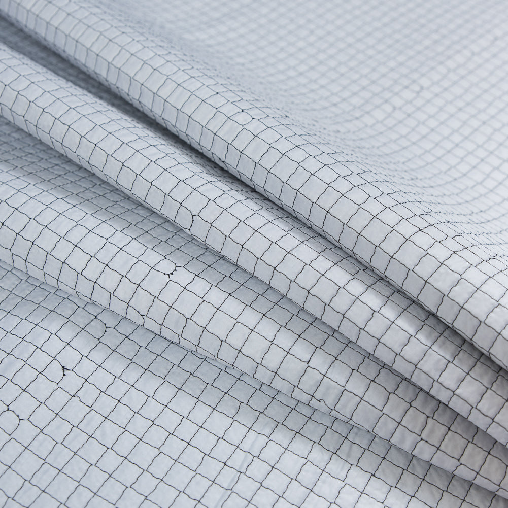 Black and White Reversible Quilted Coating with Filler - Joann Fabrics