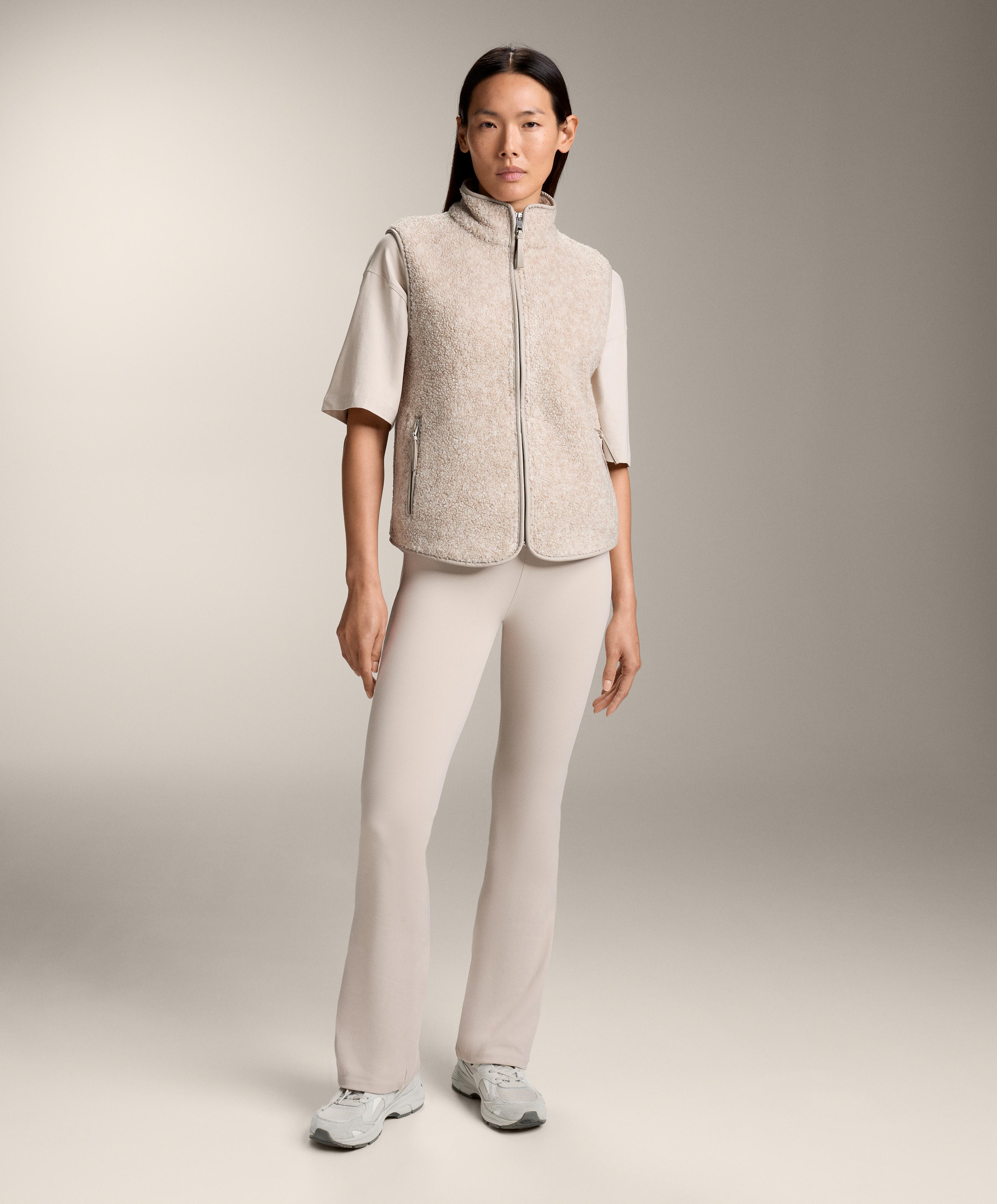 Basic faux-shearling zip-up gilet.