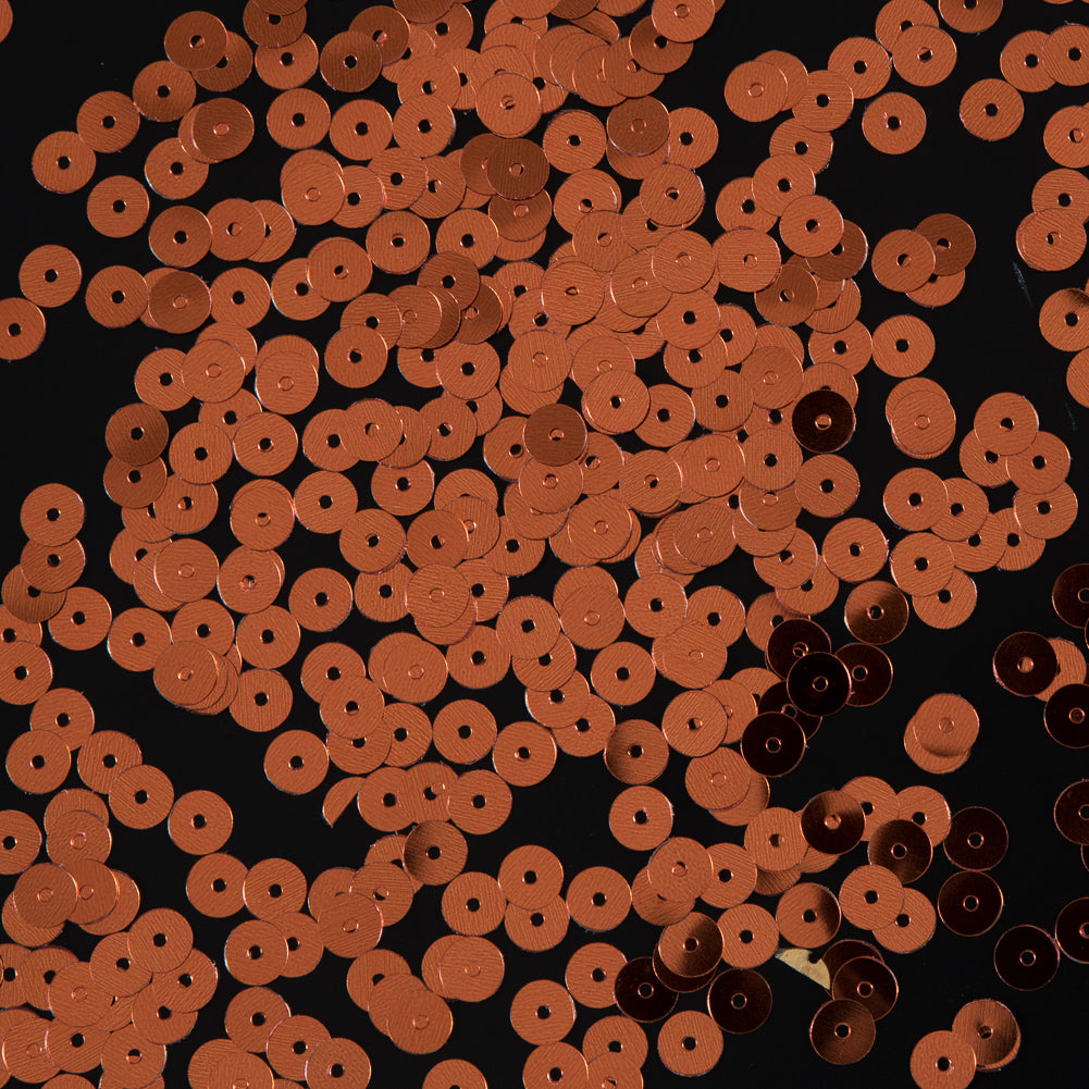 Bag of Pumpkin Color Loose Sequins with Silver Back - 6mm - Joann Fabrics