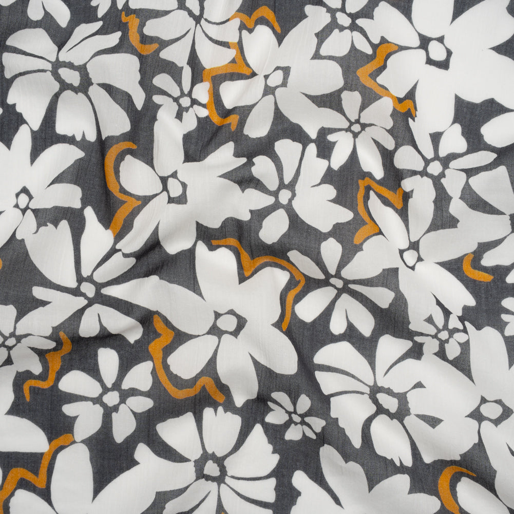 Crinkled Cotton Gauzy Woven - Charcoal Gray, Golden Orange and White Floral - Mood Exclusive Spring Squall Print - Joann Fabrics