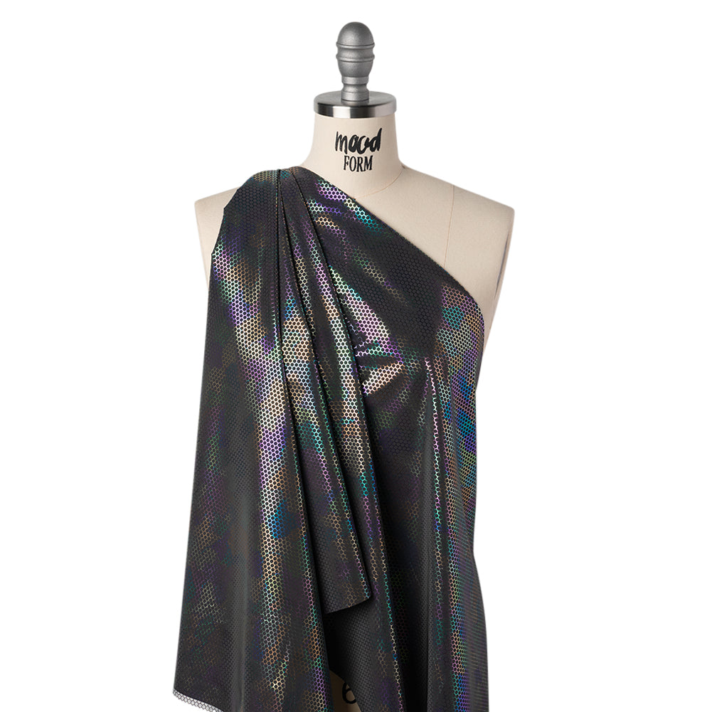 Reflective Fabric - Dark Gray Rainbow with Metallic Rainbow Oil Slick Honeycombs - Joann Fabrics