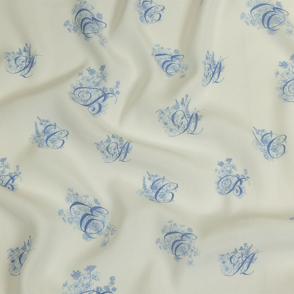 Sustainable Viscose Woven Print - White and Blue Floral Calligraphic Script - Mood Exclusive ABC Bouquet - Joann Fabrics