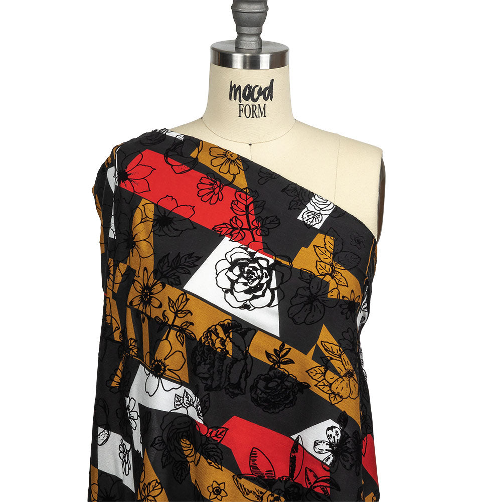 Red, Mustard and Black Flocked Flowers on Geometric Printed Viscose Woven - Joann Fabrics