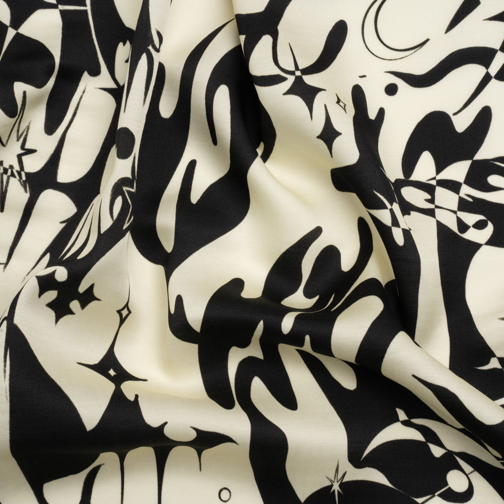 Sustainable and Recycled Viscose Satin Print - Cream and Black Abstract and Stars - Mood Exclusive Cosmic Chaos - Joann Fabrics