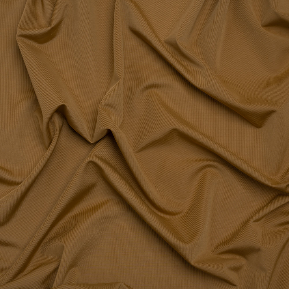 Famous Australian Designer Gold Stretch Polyester Jersey - Joann Fabrics