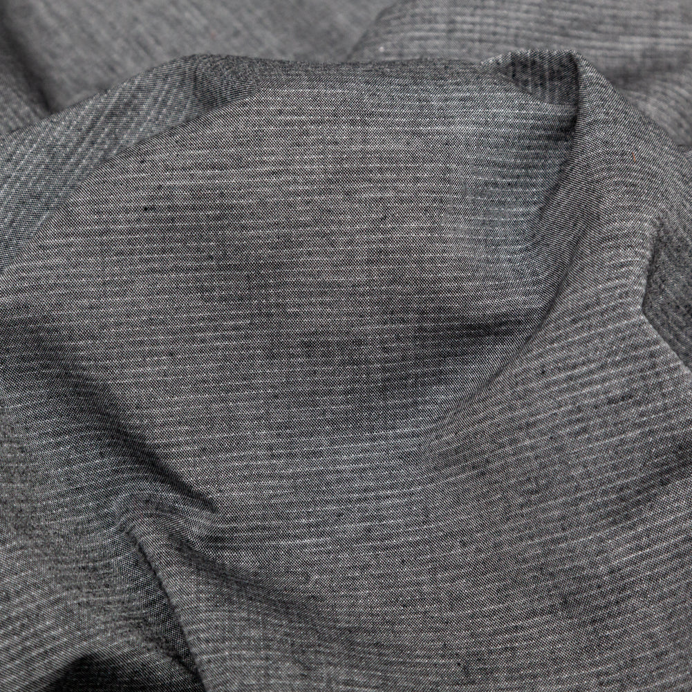 Heathered Tornado and Antarctica Reversible Perforated Cotton Chambray - Joann Fabrics