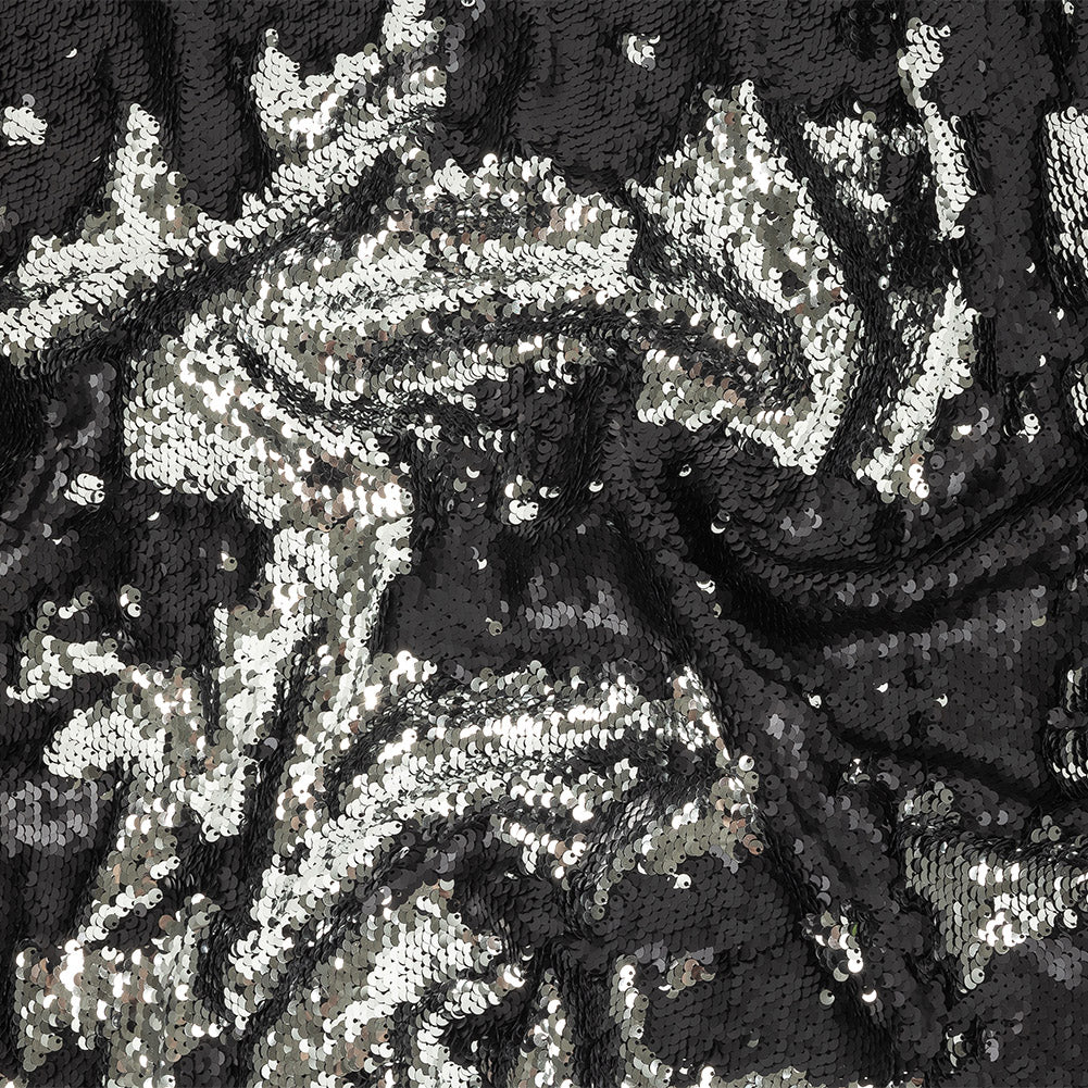 Matte Black and Reflective Silver Two-Tone Reversible Sequins on Black Polyester Jersey - Joann Fabrics