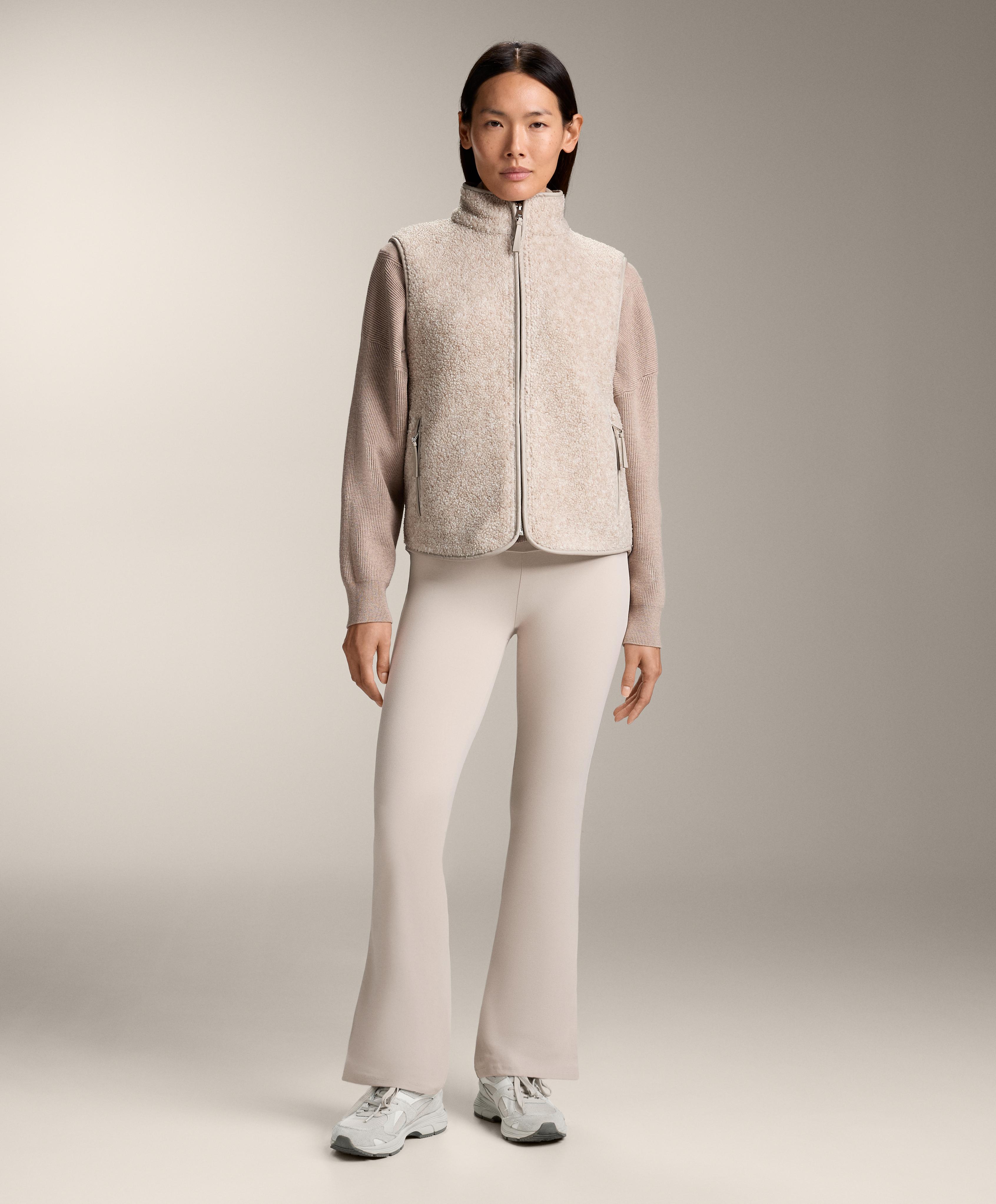 Basic faux-shearling zip-up gilet.