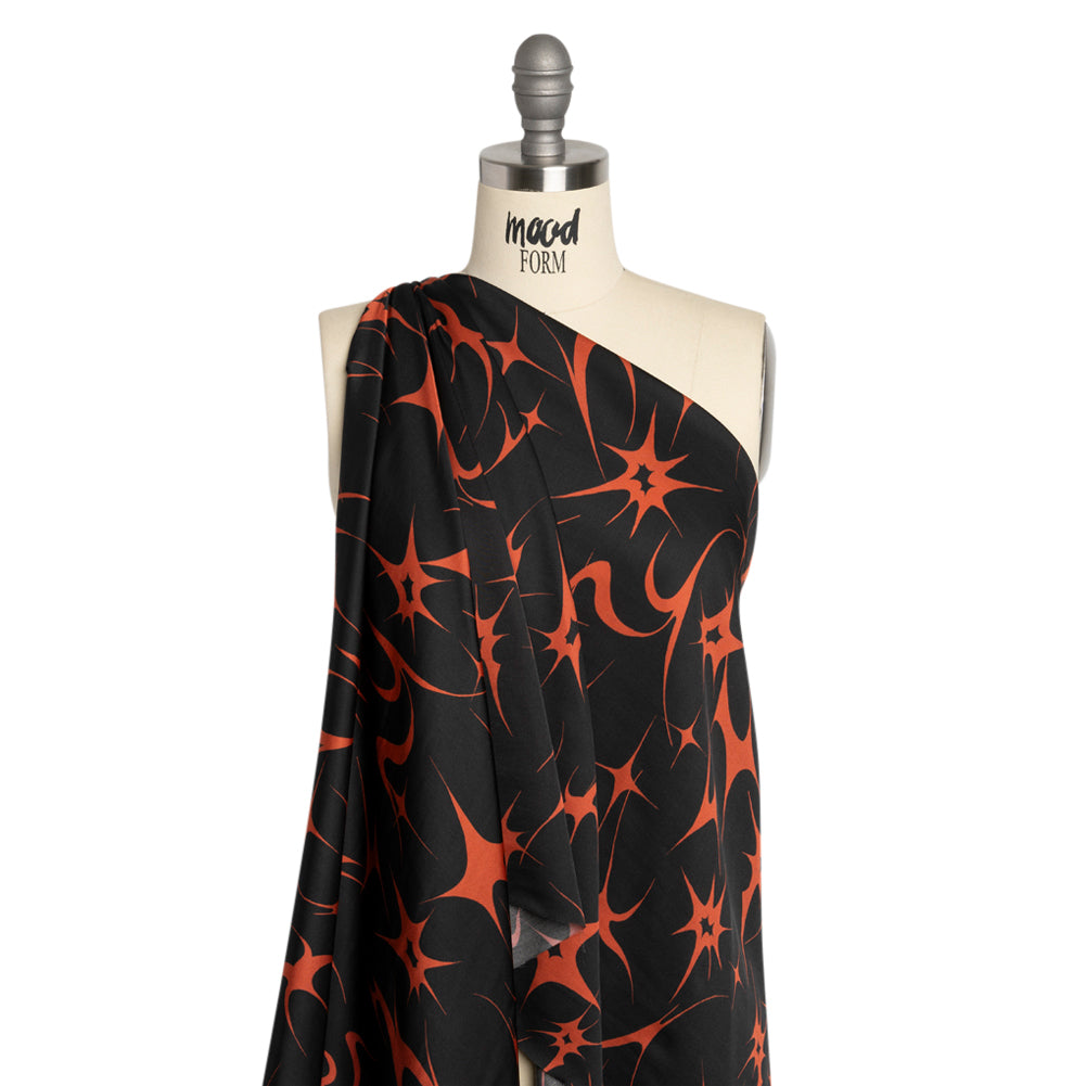 Sustainable and Recycled Viscose Satin Print - Black and Red Abstracting Stars - Mood Exclusive Speed of Light - Joann Fabrics