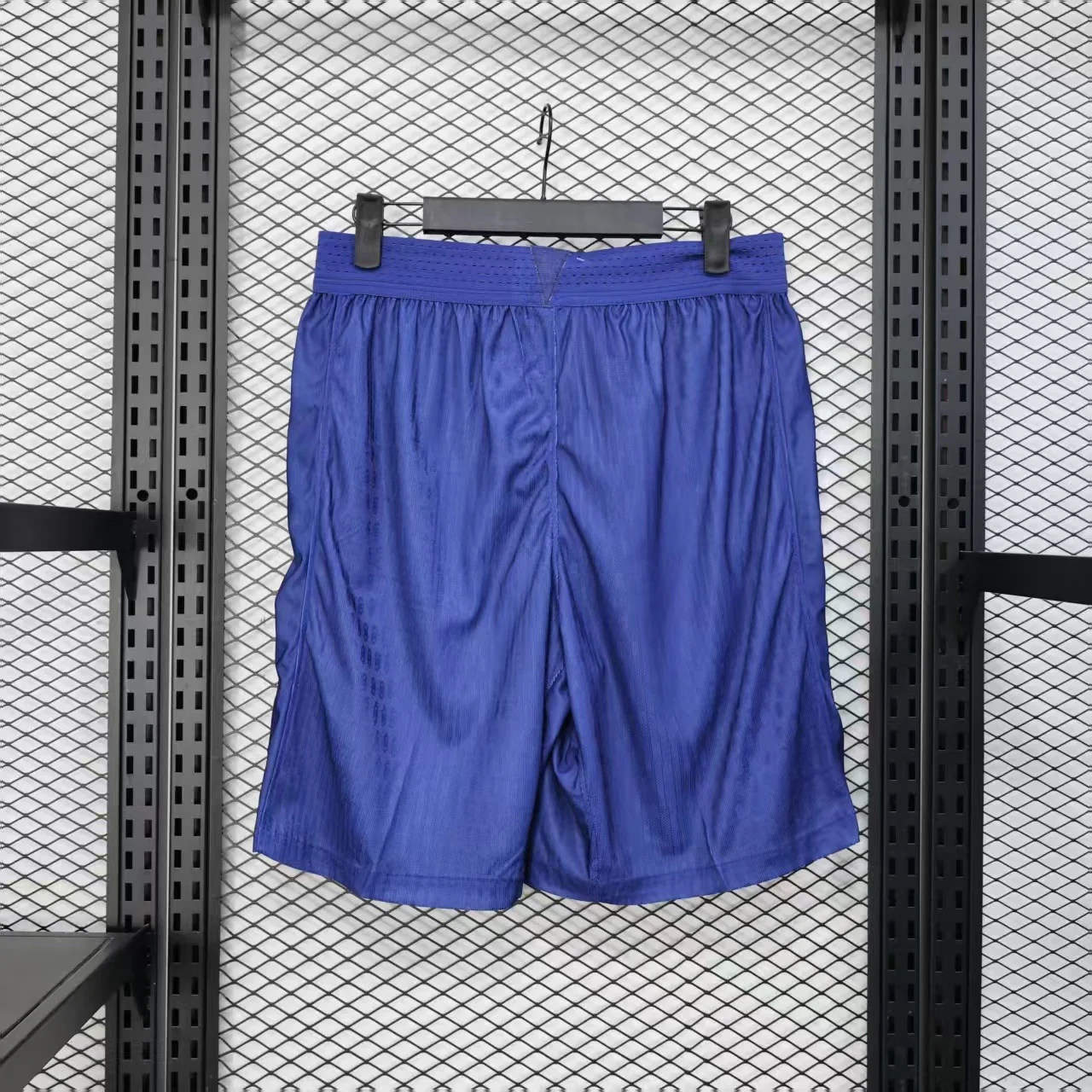 Back view of Barcelona blue home shorts showing the elastic waistband and plain blue rear panels
