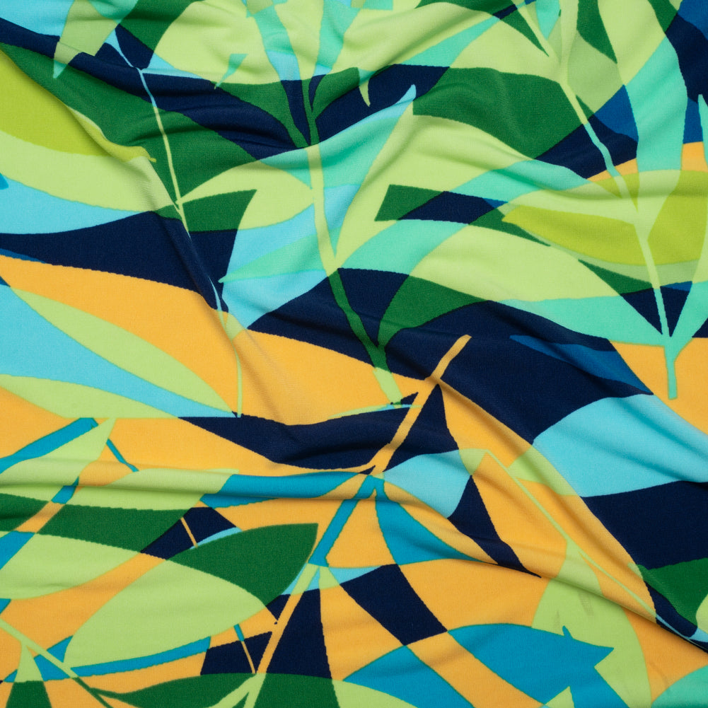 Stretch Polyester Tricot - Green, Blue and Goldenrod Overlapping Palm Leaves - Designer Deadstock - Joann Fabrics