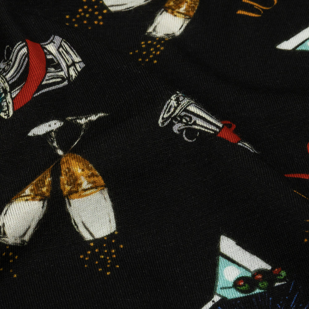 Balenciaga Italian Black, Blue and Gold Celebration Toast Stretch Cotton Jersey - Joann Fabrics