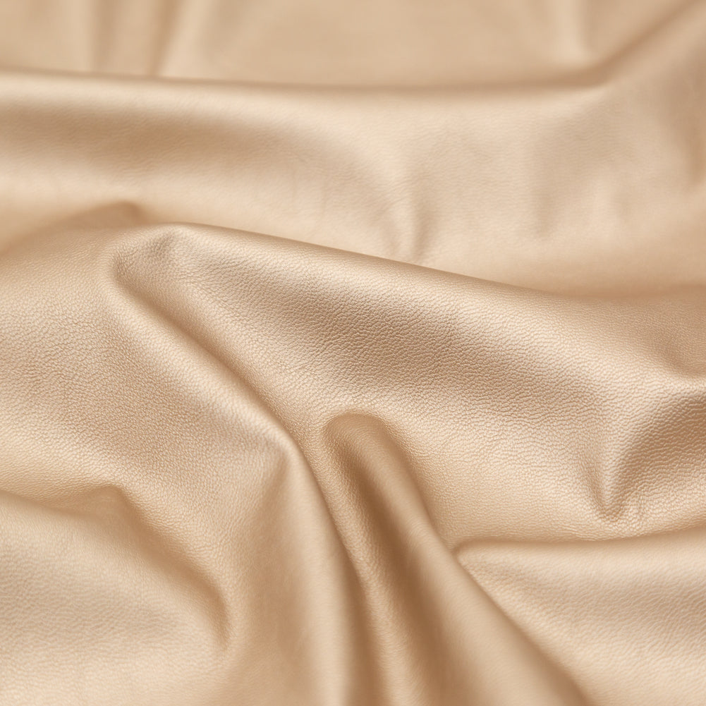Italian Metallic Champagne Faux Leather Laminate over a Latte Stretch Faux Suede - Joann Fabrics