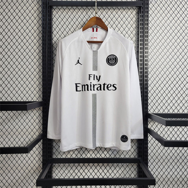 White PSG European-style long-sleeve shirt with grey centre stripe and black chest graphics