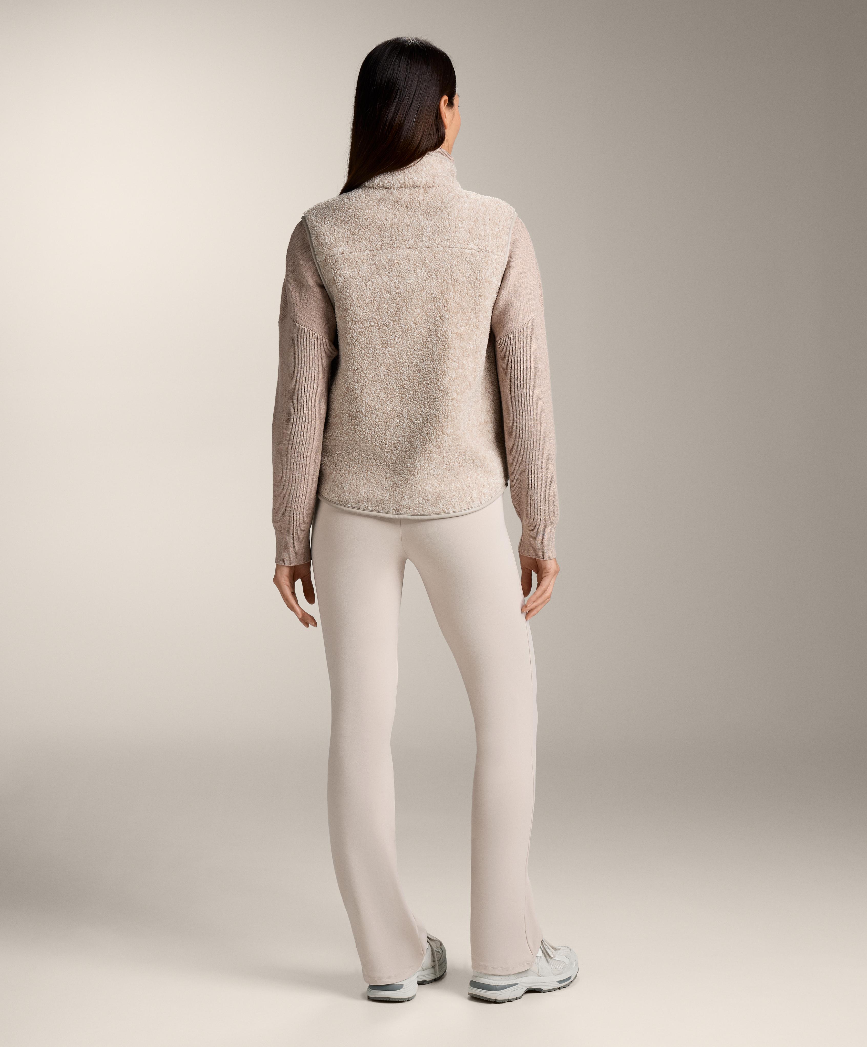 Basic faux-shearling zip-up gilet.