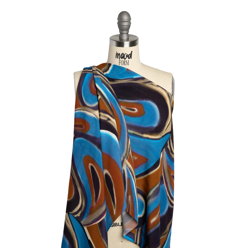 Rayon Crepe de Chine - Blue, Dark Purple and Burnt Orange Abstract Swirls - Made in Italy - Joann Fabrics
