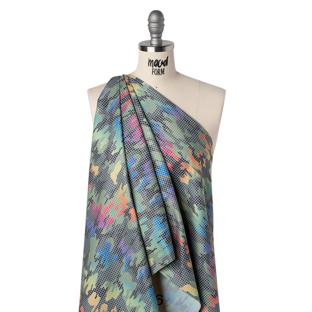Reflective Print Fabric - Olive Green and Rainbow Camouflage with Silver Gray Grid - Joann Fabrics