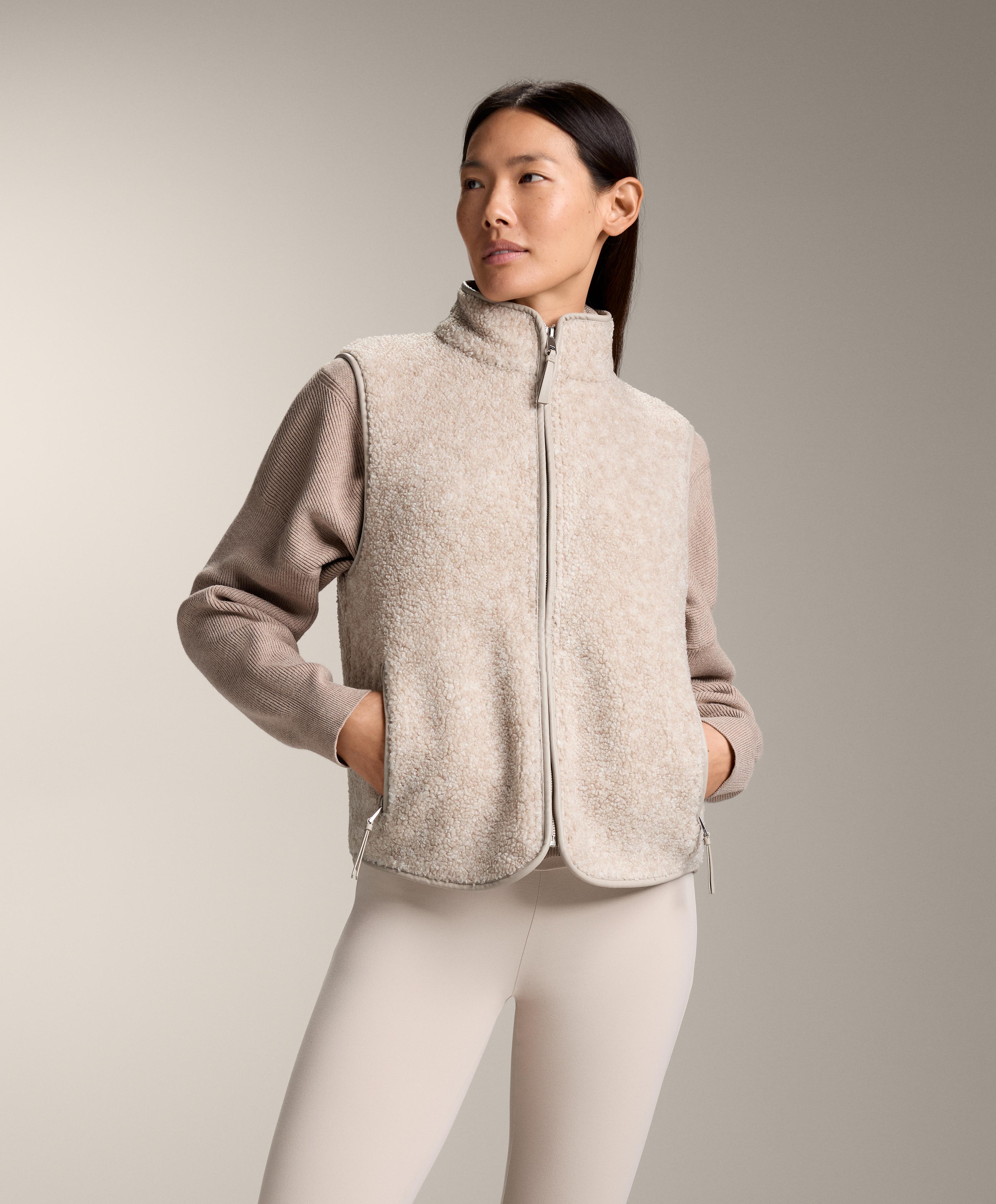 Basic faux-shearling zip-up gilet.