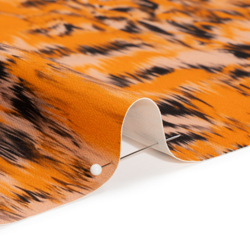 Stretch Polyester Woven Print - Orange and Black Abstract Ikat - Mood Exclusive Shifting Sands - Joann Fabrics