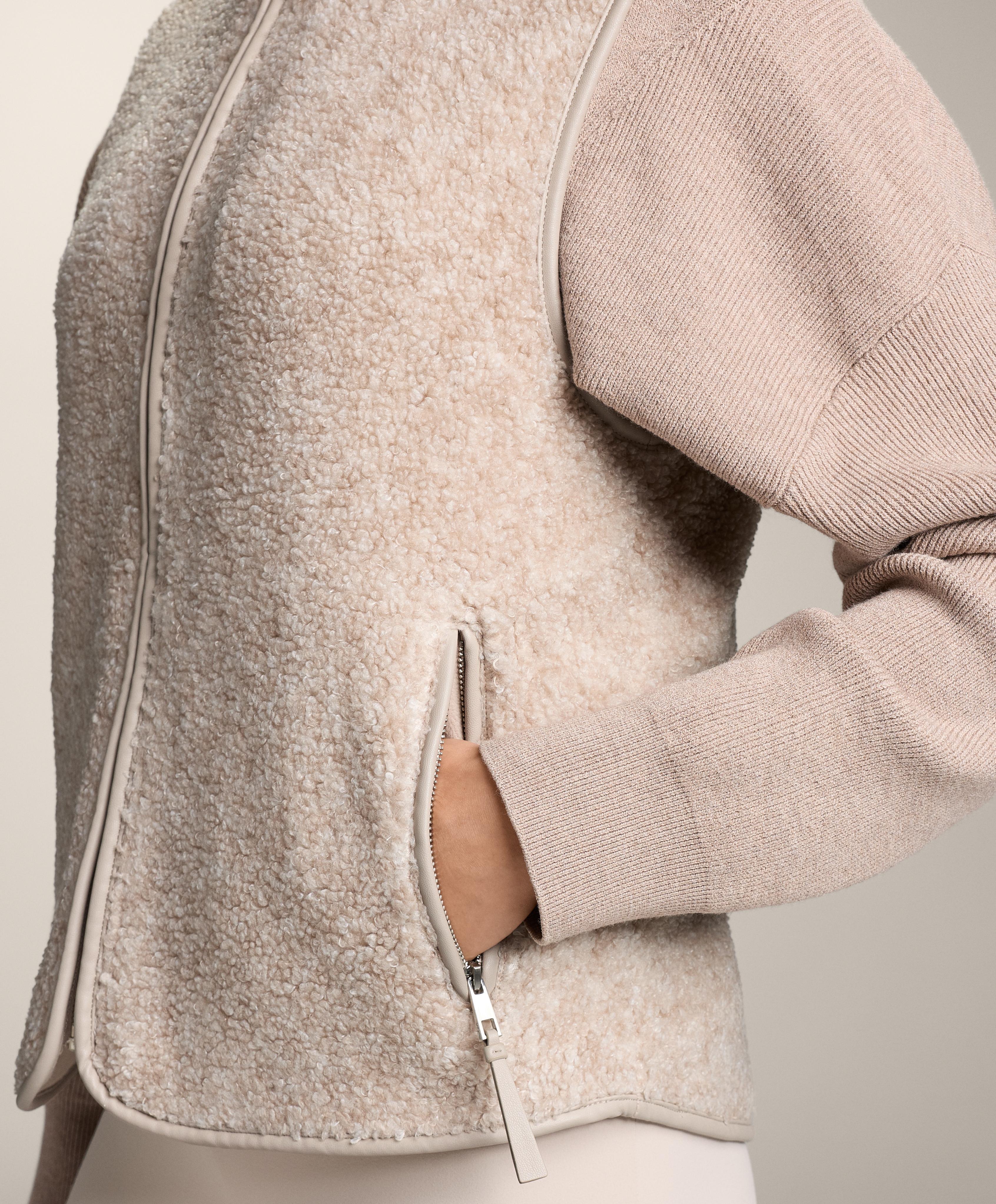 Basic faux-shearling zip-up gilet.