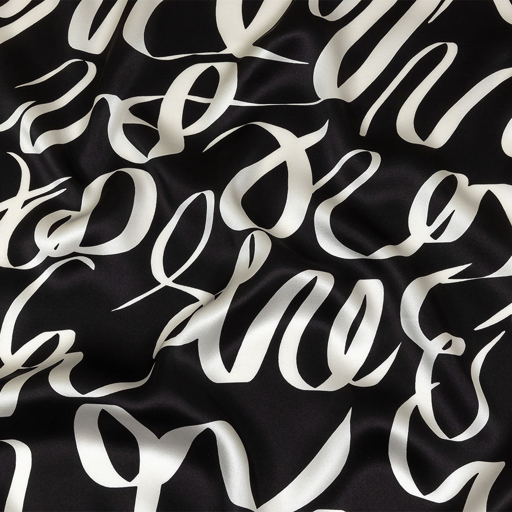 Mood Exclusive Italian Black Bean and White Calligraphic Squiggles Silk Charmeuse - Joann Fabrics