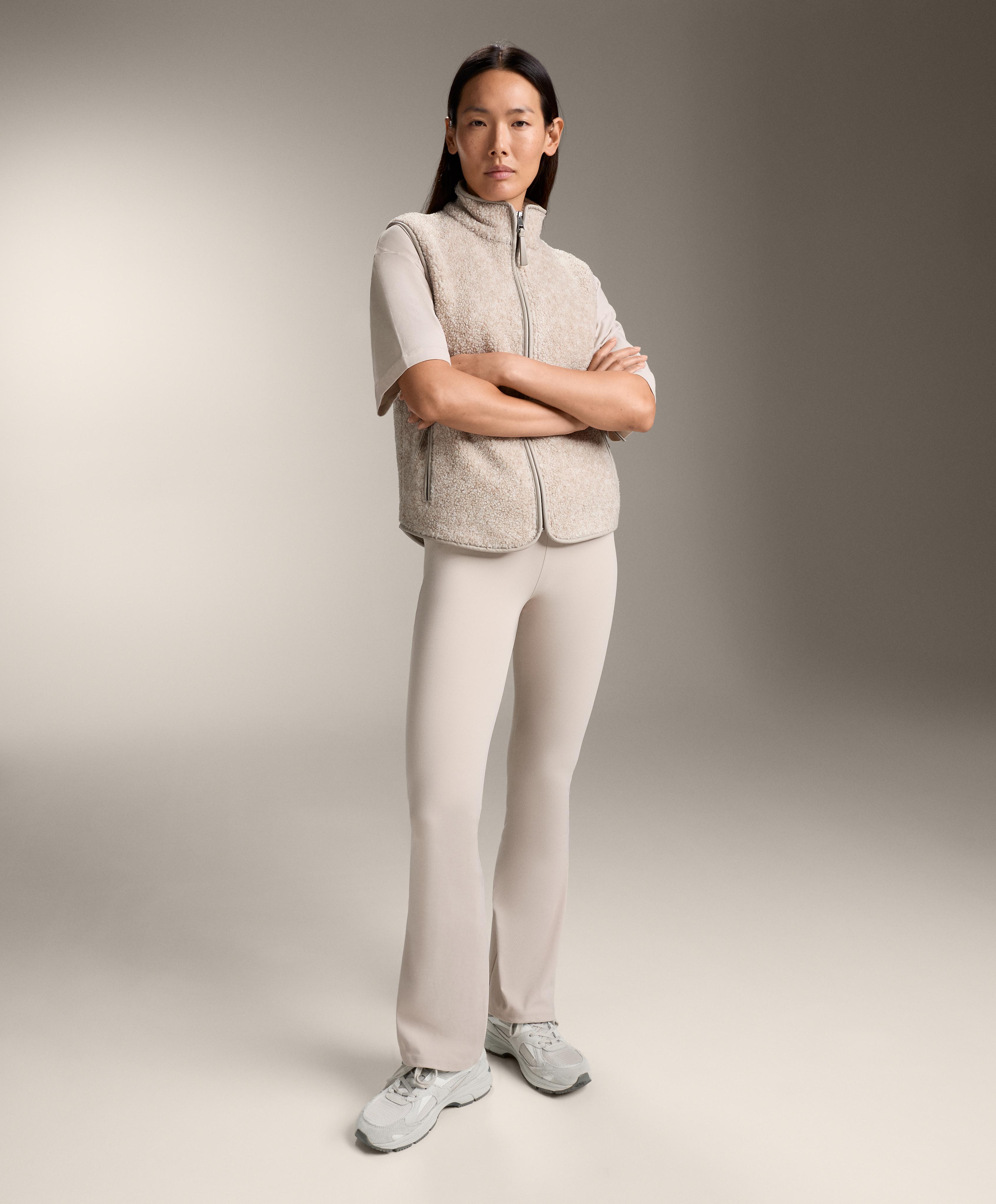 Basic faux-shearling zip-up gilet.
